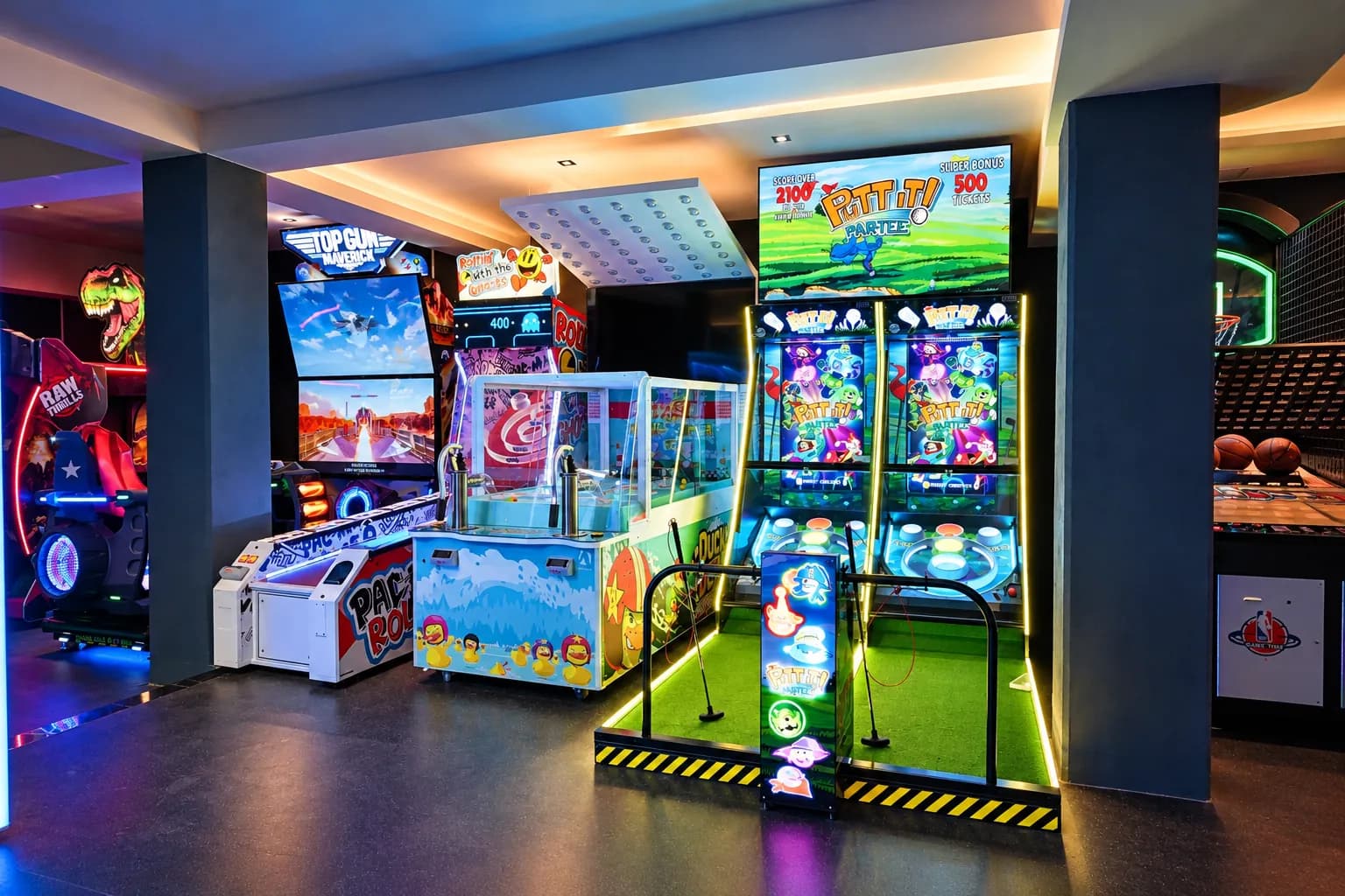 Arcade games and lounge area at Trobbu Secret Cave