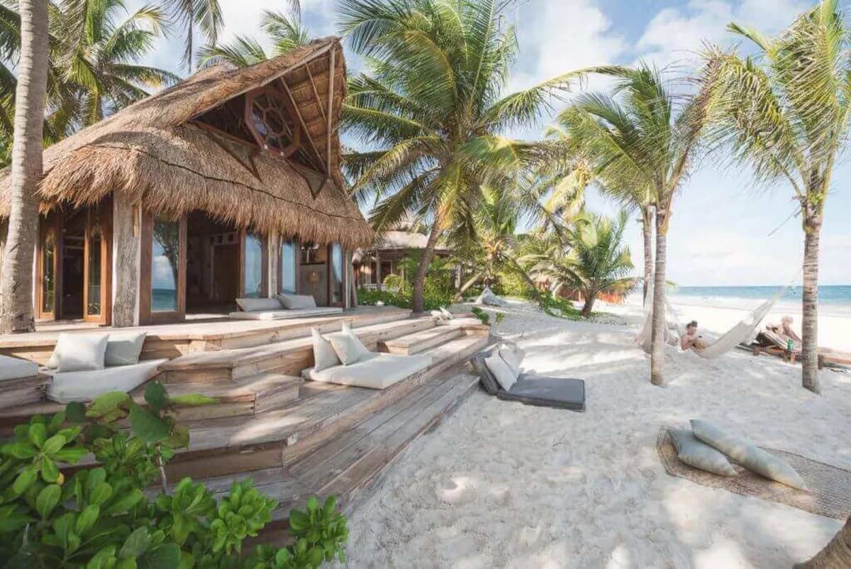 TROBBU Riviera Maya unlimited access - guest relaxing at luxury villa suite